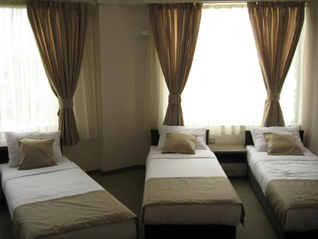 Domus Aparthotel Skopje Rum bild